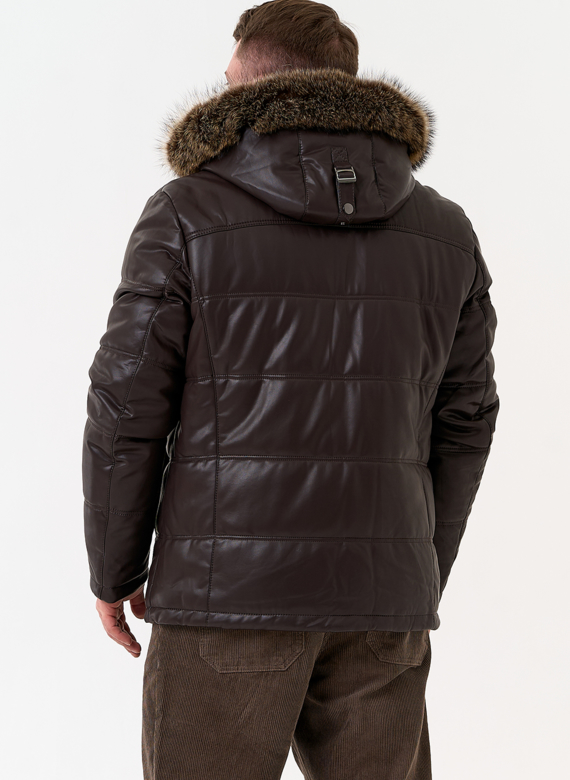 Пуховик из эко кожи с капюшоном из меха енота